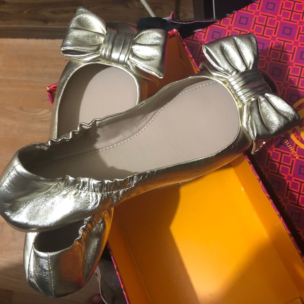 Tory Burch gold flats